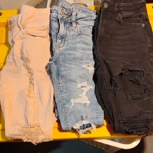 3 PAIRS OF AMERICAN EAGLE JEANS
